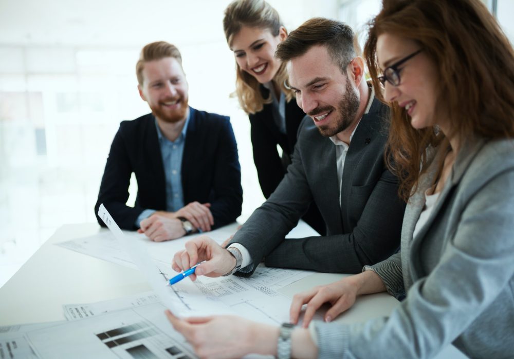 business-people-working-together-on-project-and-brainstorming-in-office.jpg